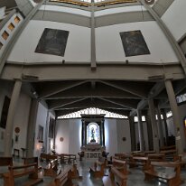 il lato destro e la base della cuspide con i dipinti di Sant'Andrea davanti al Tirammo e il suo martirio